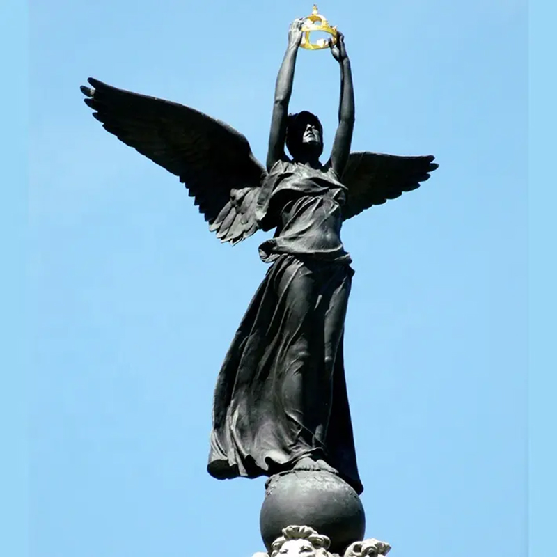 Winged Victory Bronze Sculpture holding a golden crown aloft