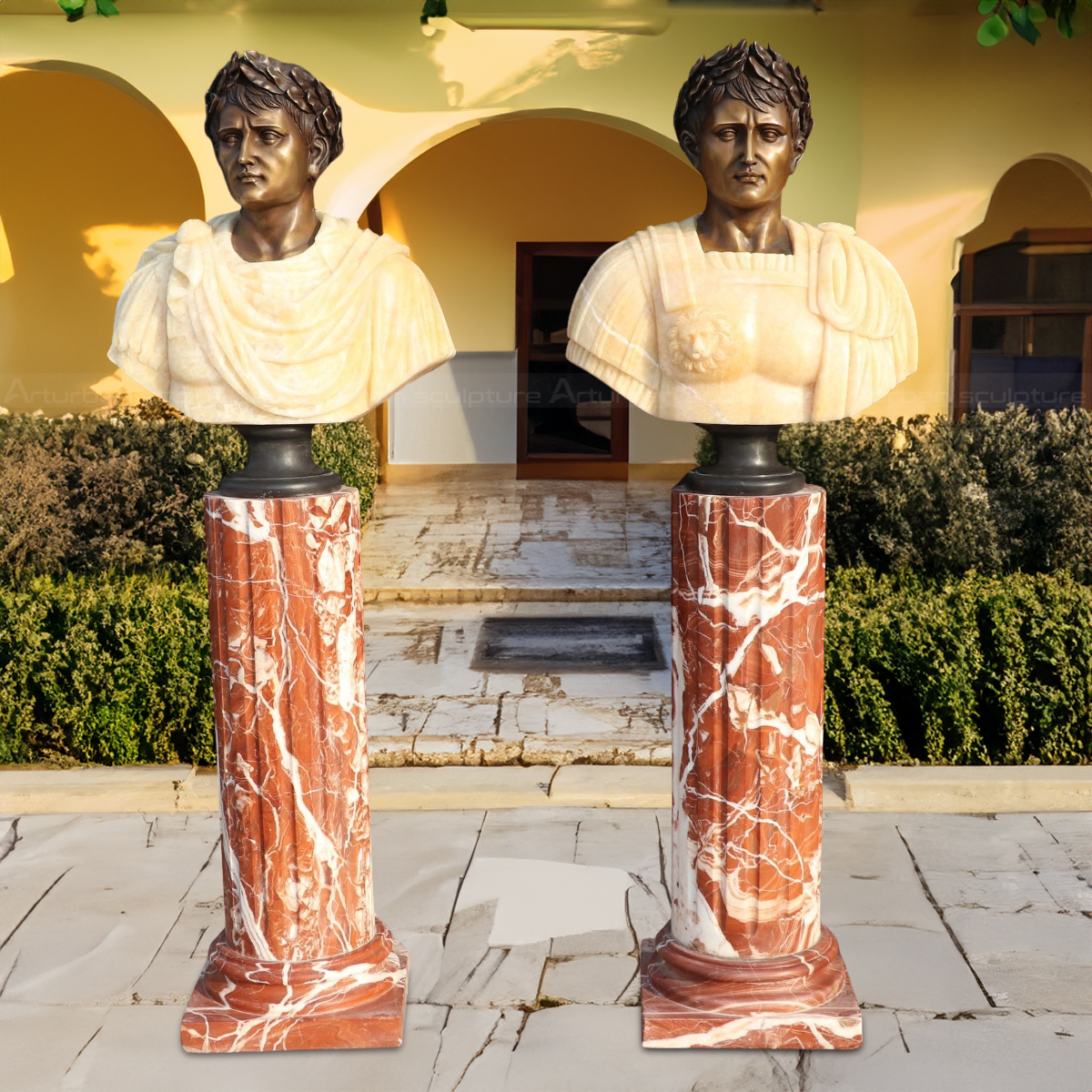 a pair of Roman Statue of Augustus Bust placed on red and white pedestals