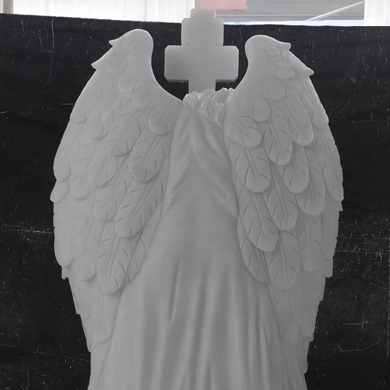 back view of Grieving Angel Headstone marble statue showing delicate feather details1
