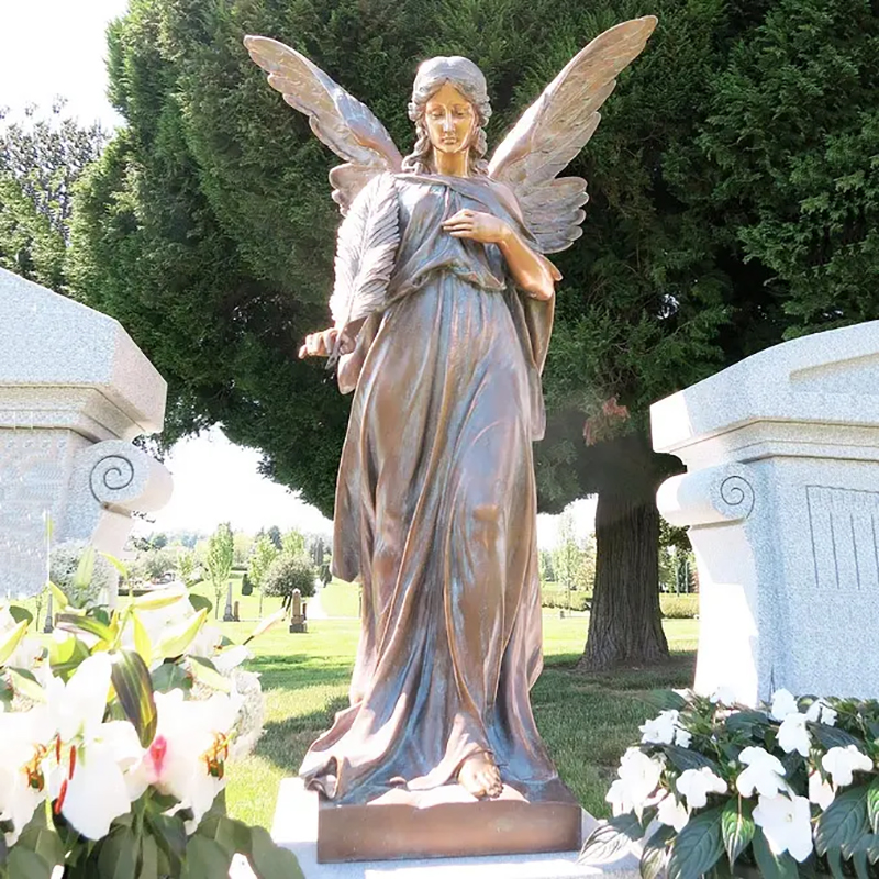 bronze Angel Statue holding a palm leaf for Funeral