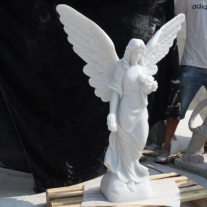 cemetery Angel Garden white marble statue with wide wings