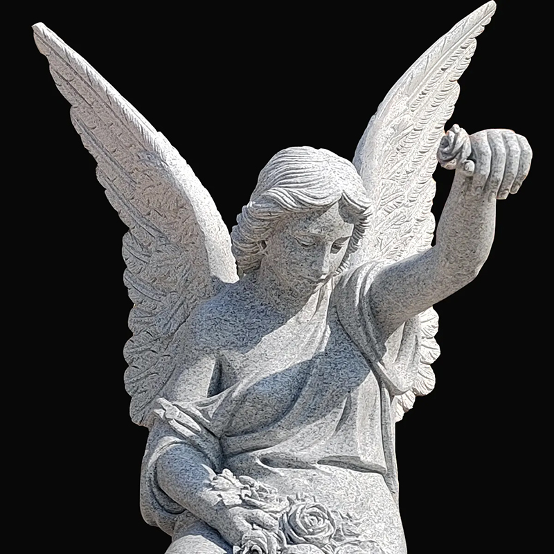 close-up of Angel Sculpture for Garden highlighting the gesture of scattering flowers