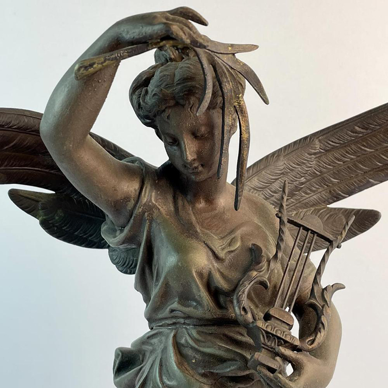 close-up of Musical Angel Statue's head and upper body