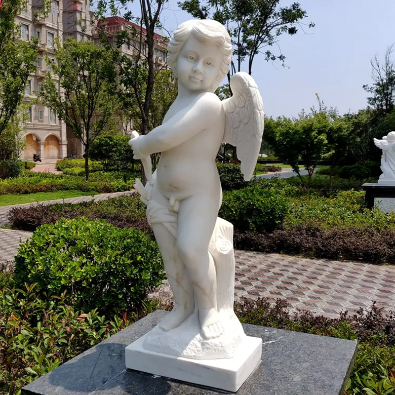 marble Cupido Statue standing on a pedestal