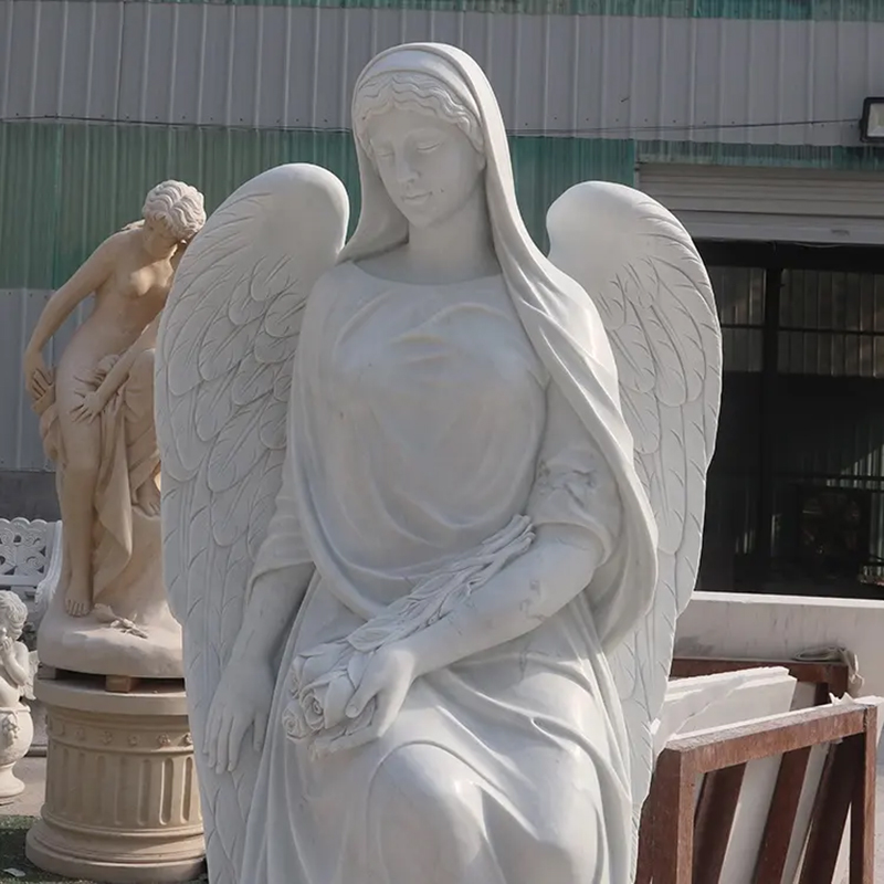 marble statue of Sitting Garden Angel with large wings
