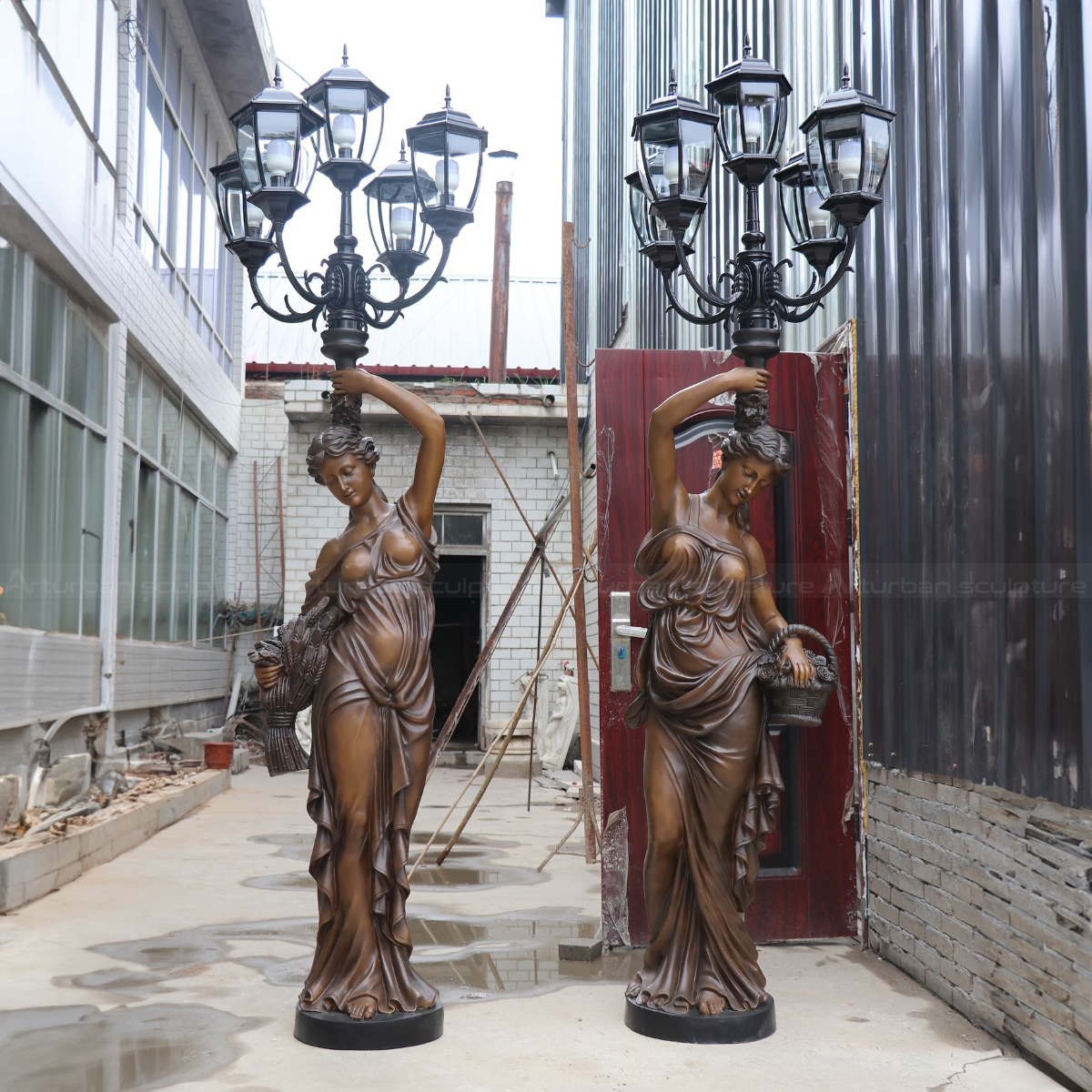 pair of bronze European Decorative female figure holding Lamp Statue