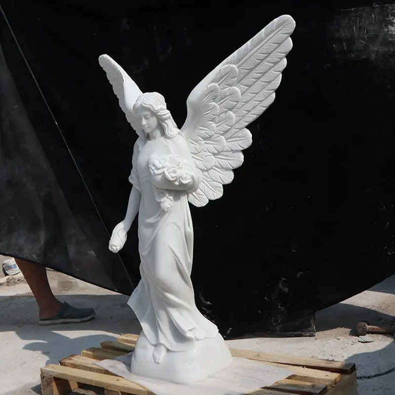side view of white marble Angel Garden Statue for memorial or graveyard
