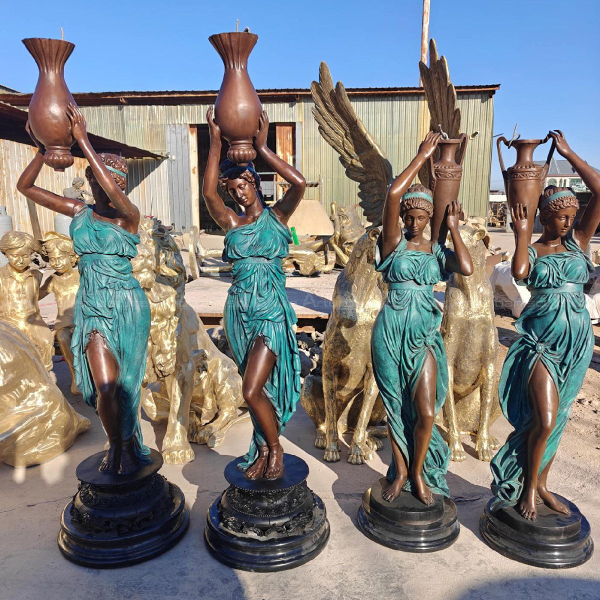 two pair of bronze Woman with Vase Statues