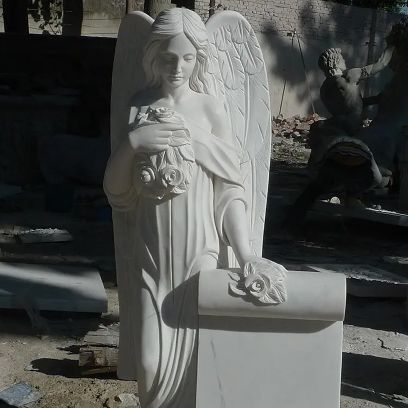 white marble Cemetery Angel standing a large scroll with flowers Headstones for Sale