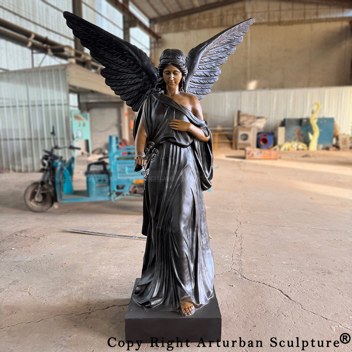 bronze Memorial Angel Statue standing holding roses