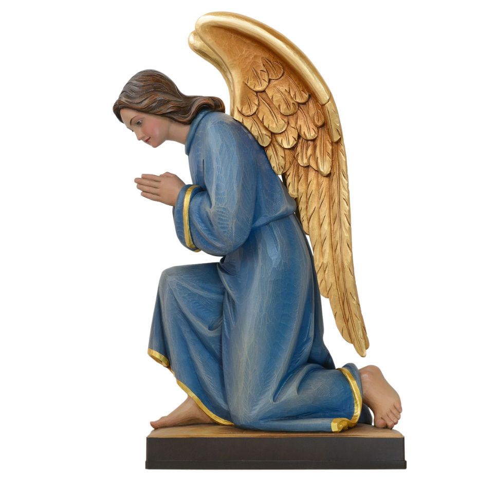 A kneeling angel statue with golden wings and a blue robe
