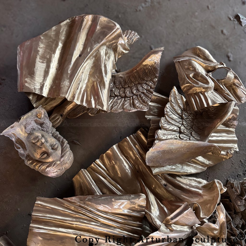 Cast segments of the memorial angel statue