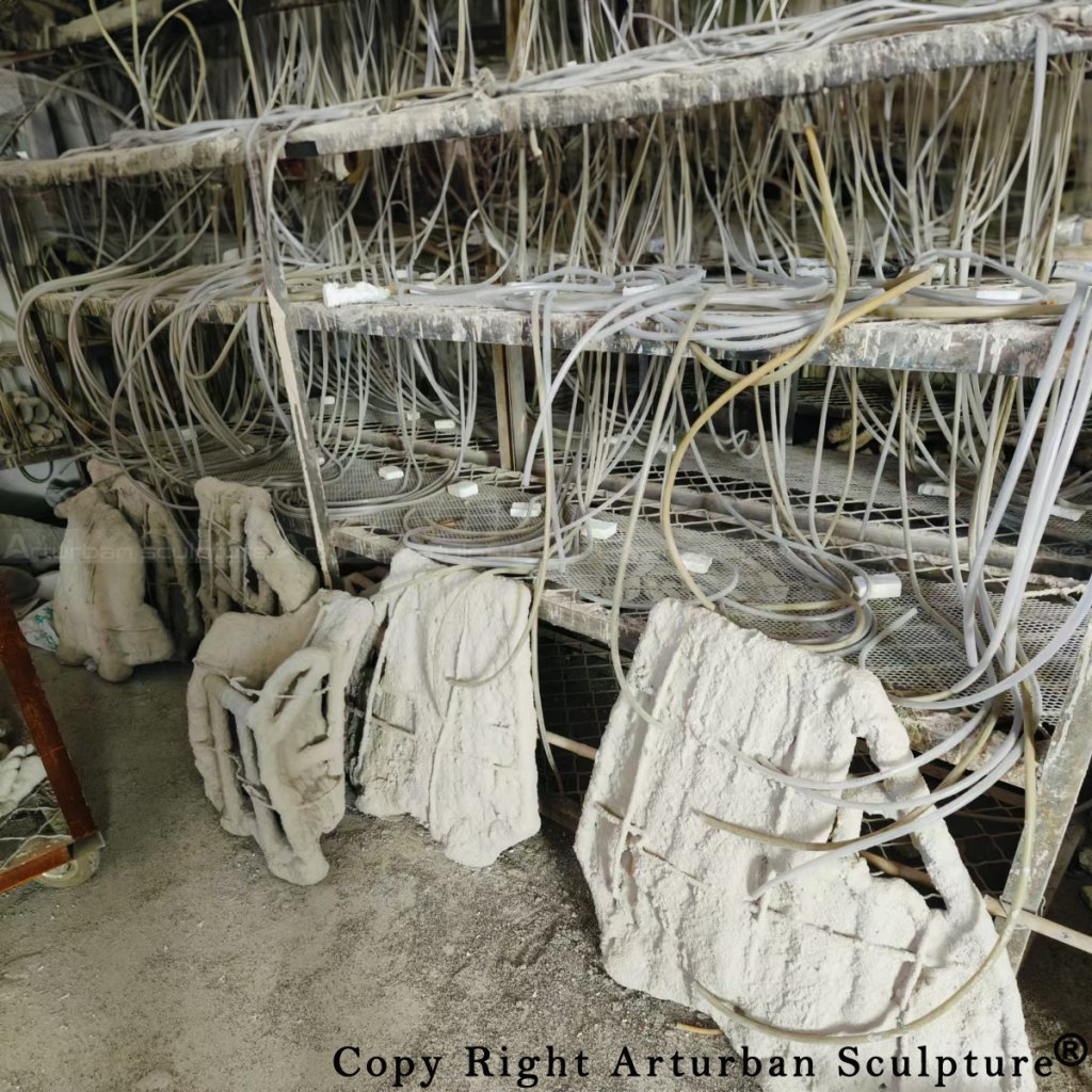 Ceramic shell molds of the kneeling angel statue