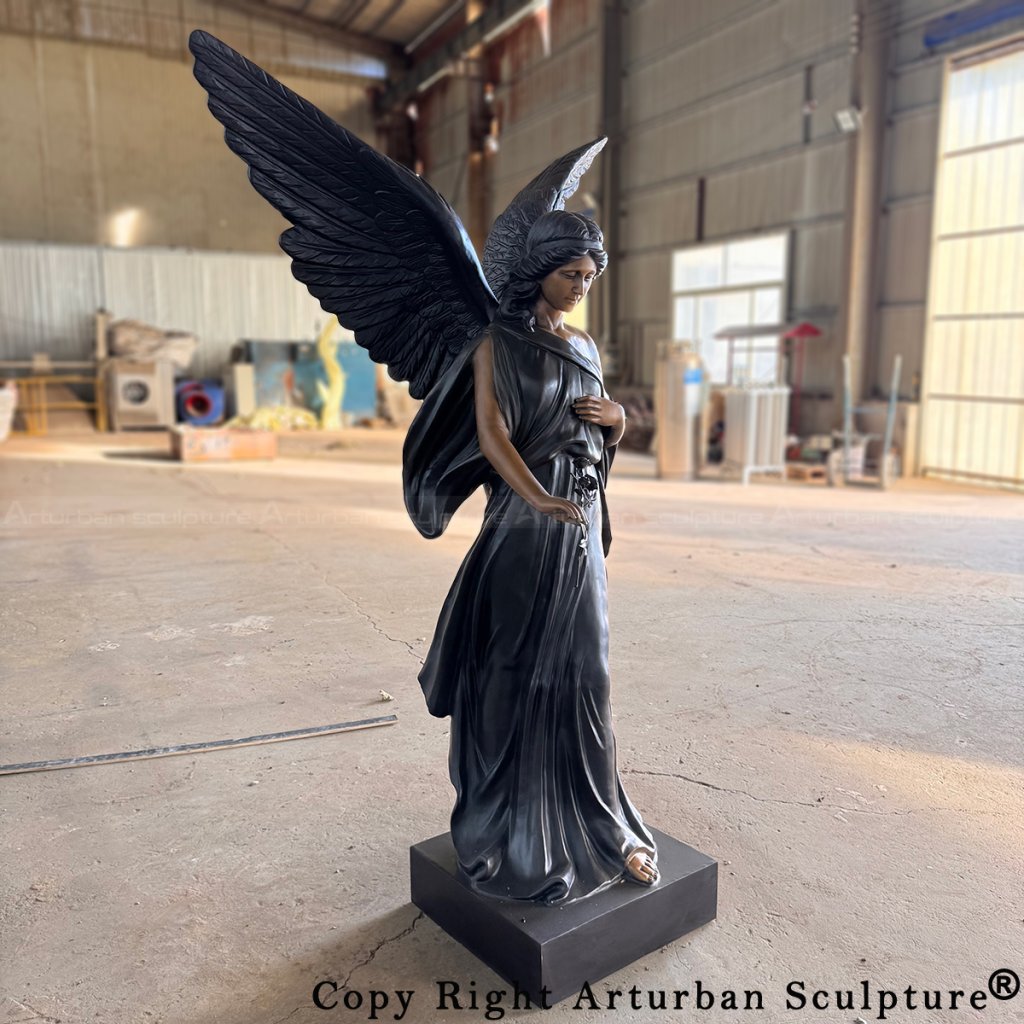 Dark patina Memorial Angel Sculpture hand on chest and rose in hand
