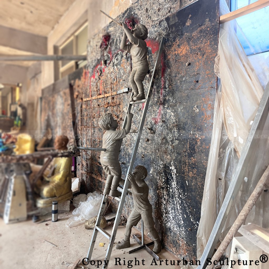 clay mold of Children on Ladder Statue
