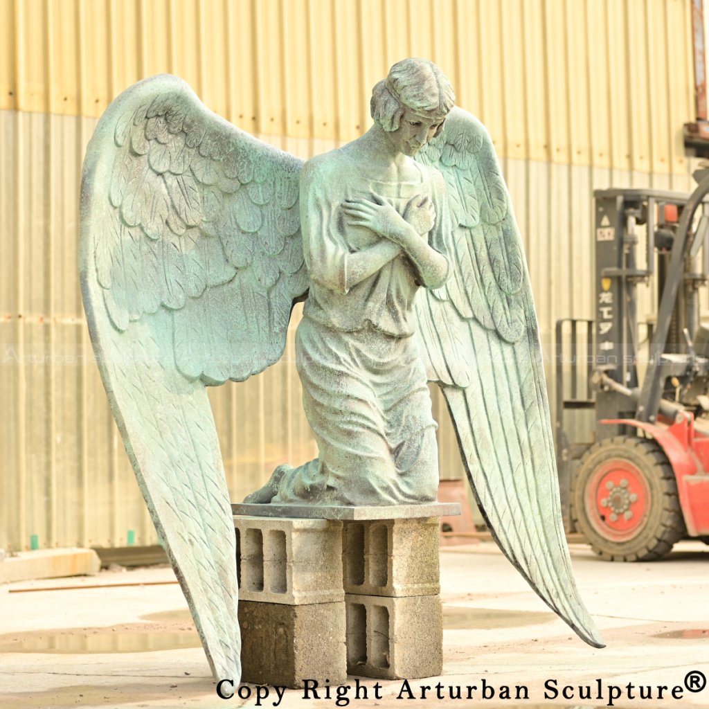 Cemetery Angel kneelingStatue