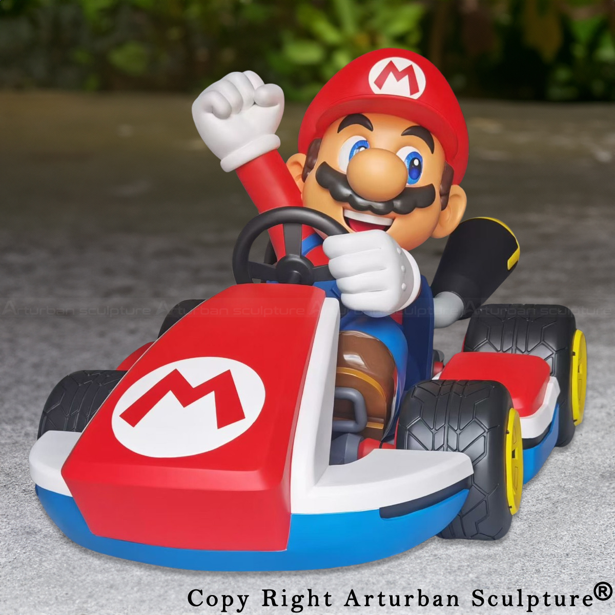 fiberglass Nintendo Mario Kart Statue with Mario raising his fist
