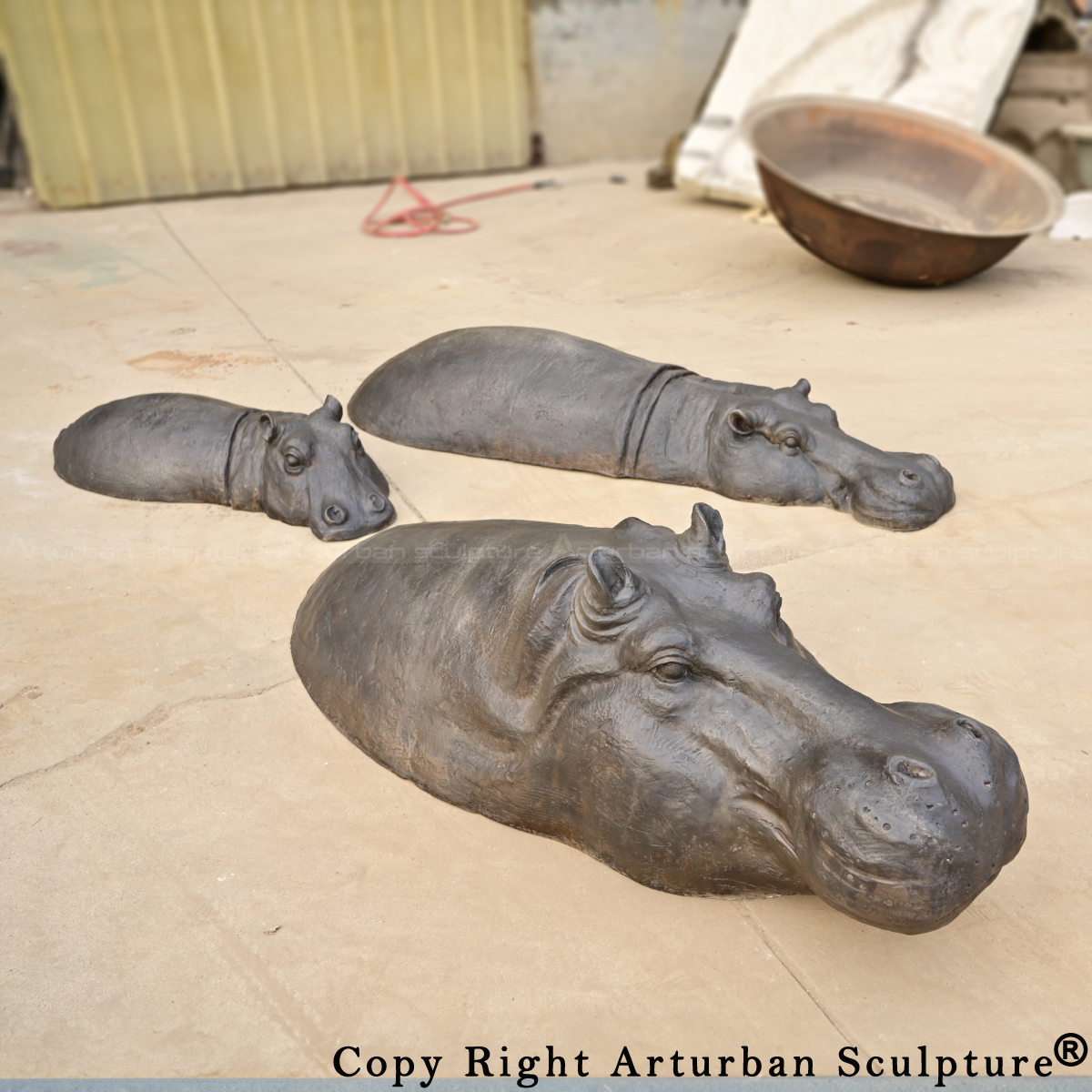 Finished Bronze Hippopotamus sculptures, showing realistic surface texture