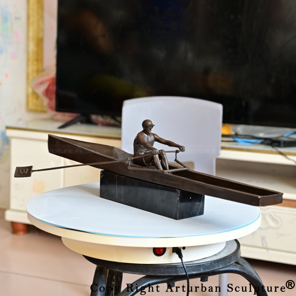 realistic bronze rowing sculpture
