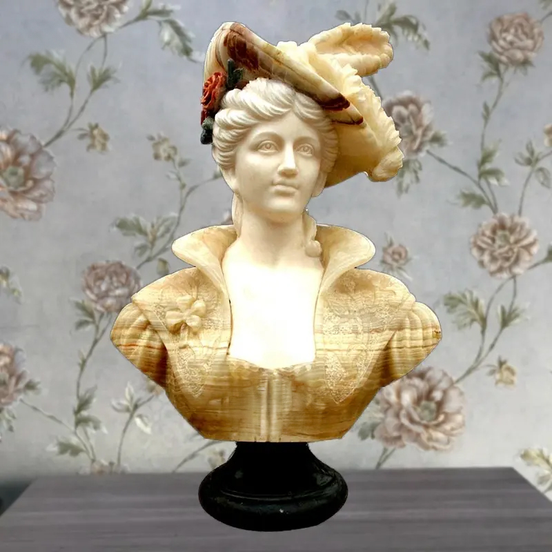 A Bust of Female sculpture in dual-tone marble, depicting a refined woman with a wide-brim hat and high-collared dress