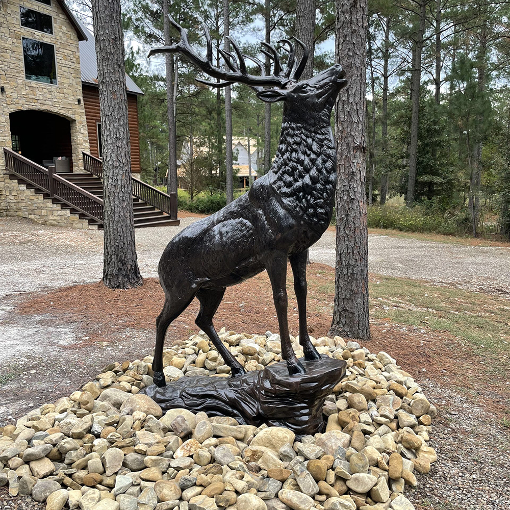 A majestic bronze Elk Statue for Sale featuring a powerful male elk with large antlers2