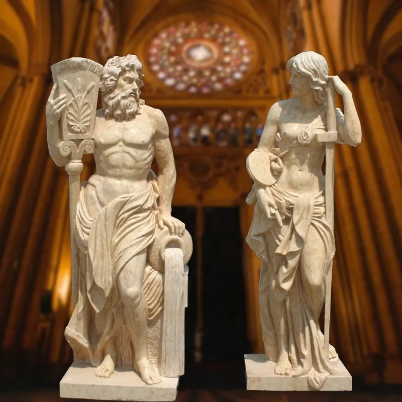 A pair of marble Classical Garden Ornaments depicting a river god holding a water jar and a female figure with a tambourine