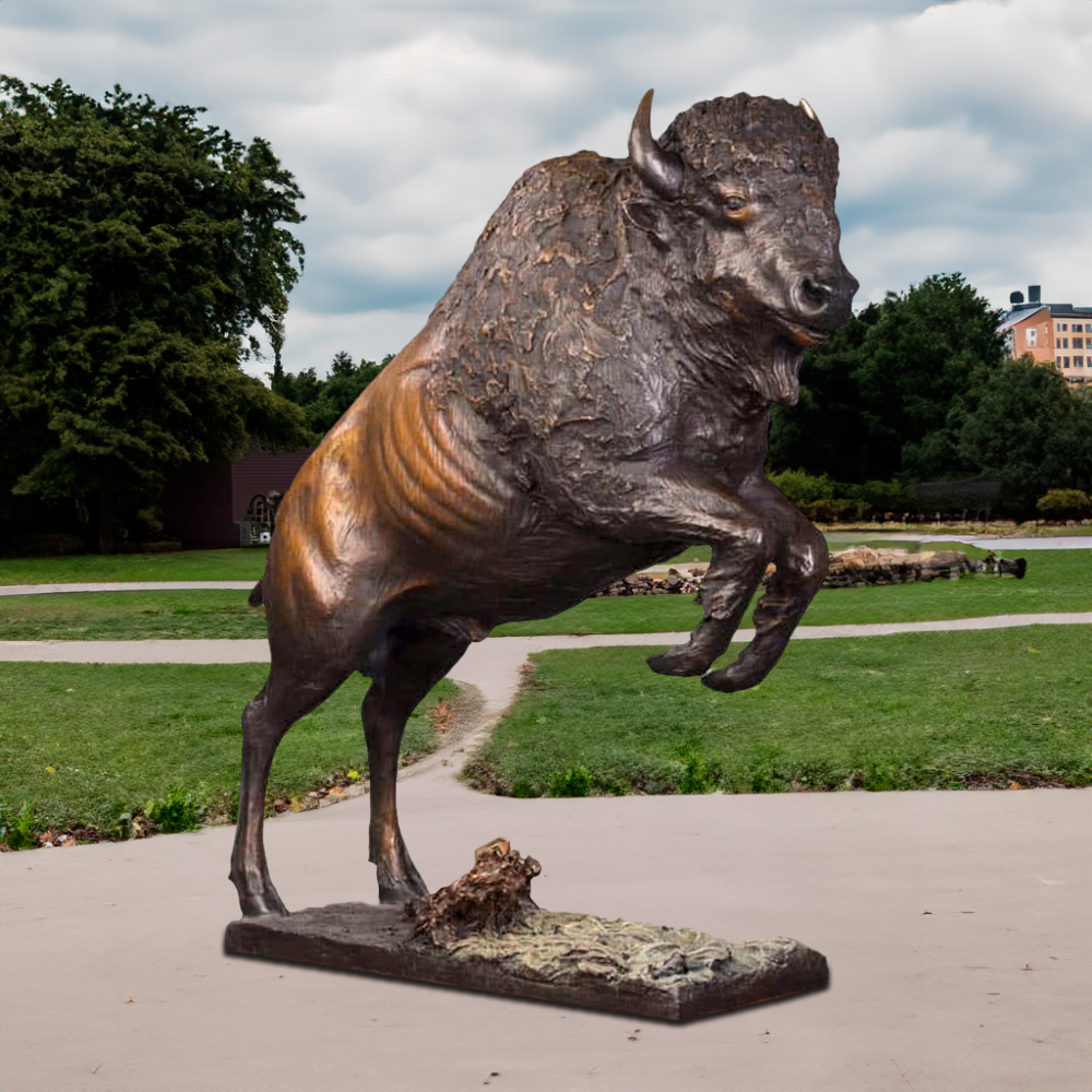 American Bison Statue featuring a bronze sculpture of a rearing bison with powerful muscles and dynamic pose