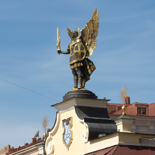 Archangel Michael statue atop the main gate of Kyiv Independence Square, holding a sword and shield