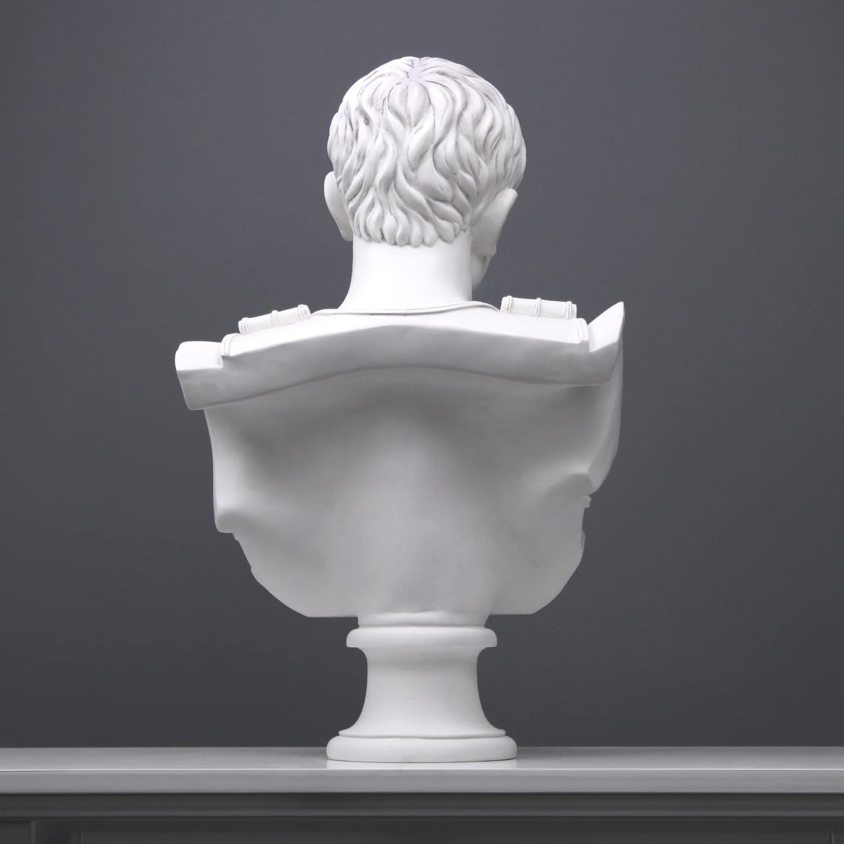 Back view of Augustus Marble Bust showing sculpted cloak