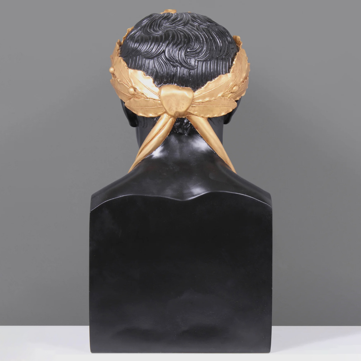 Back view of Napoleon Bonaparte bust sculpture in marble with golden laurel wreath