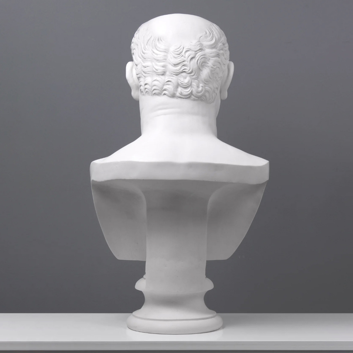 Back view of bust of Emperor Vespasian in marble