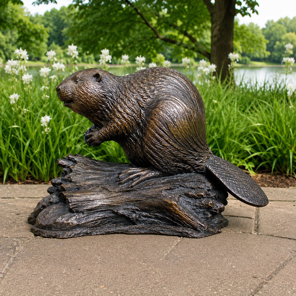 Bronze Beaver Sculpture on textured log outdoors