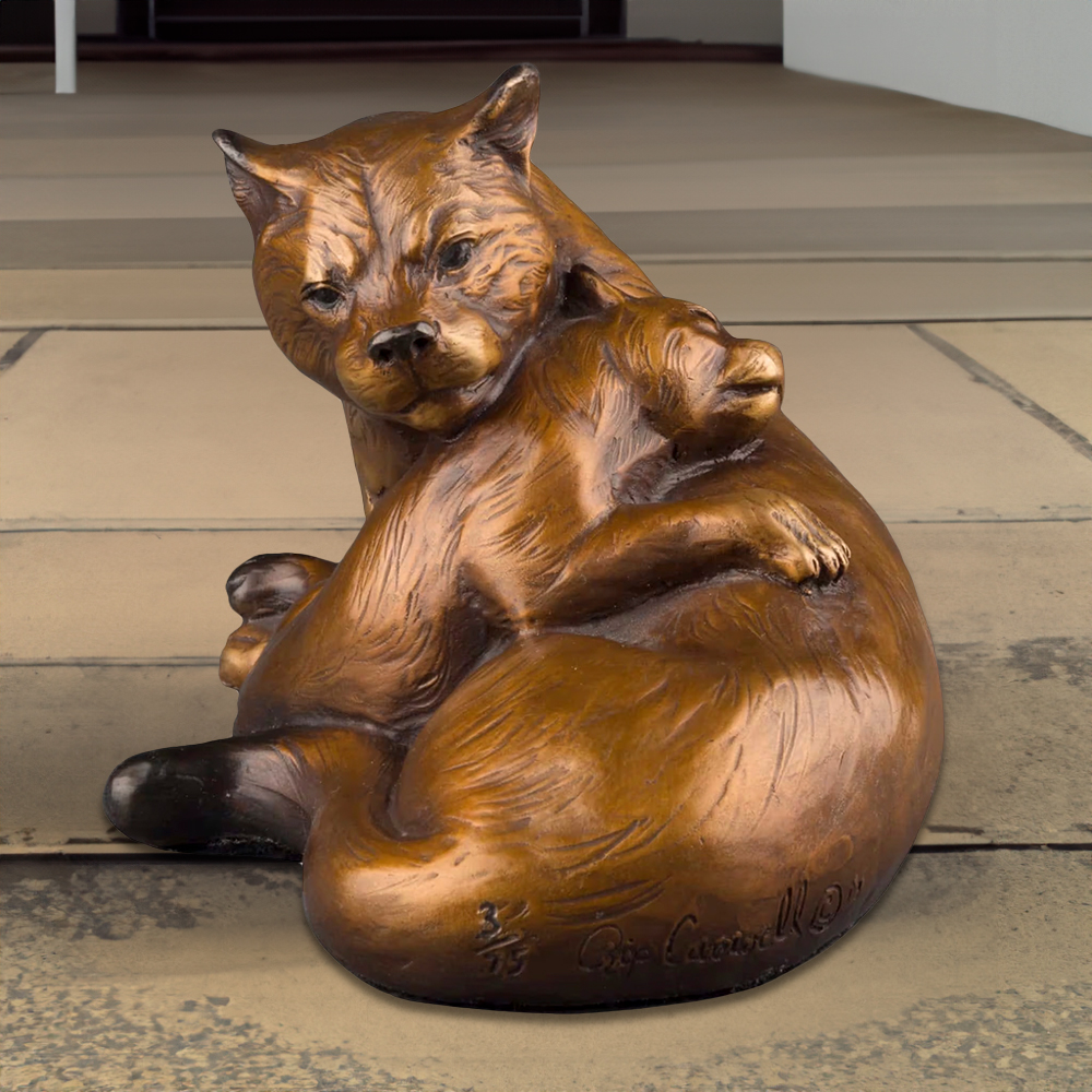 Bronze Mountain Lion Statue showing a tender moment between a mountain lion and her cub