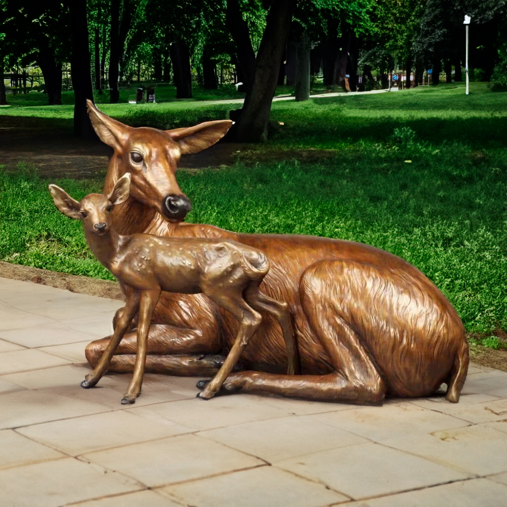 Bronze Outdoor Deer Ornaments featuring a lifelike white-tailed doe resting beside her spotted fawn