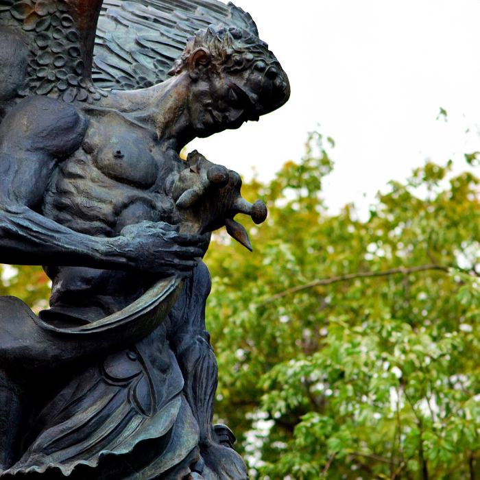 Close-up of Archangel Michael holding a decapitated Satan head at the Peace Fountain in New York