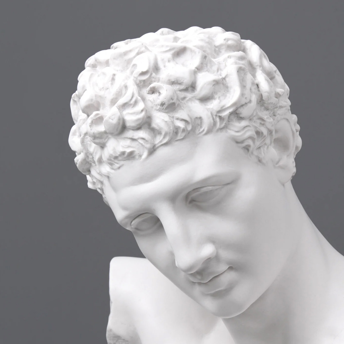 Close-up of Hermes Bust head carved in white marble