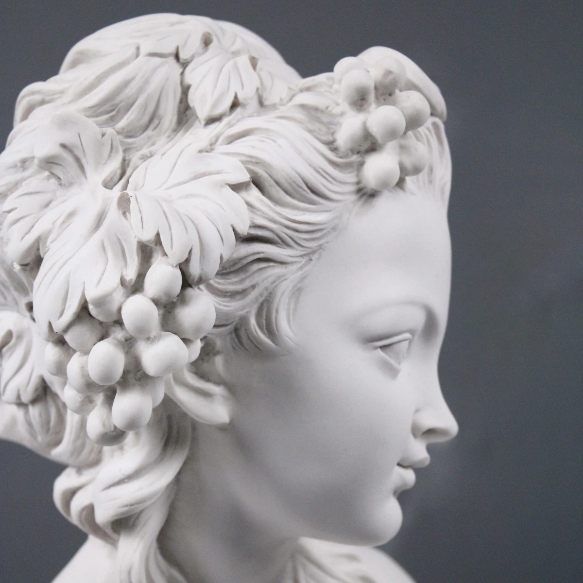 Close-up of Vintage Lady Bust hair with grape clusters
