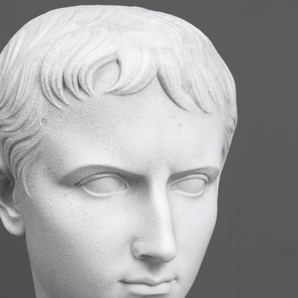 Close-up view of marble Augustus Head Sculpture highlighting precise carving of eyes and forehead