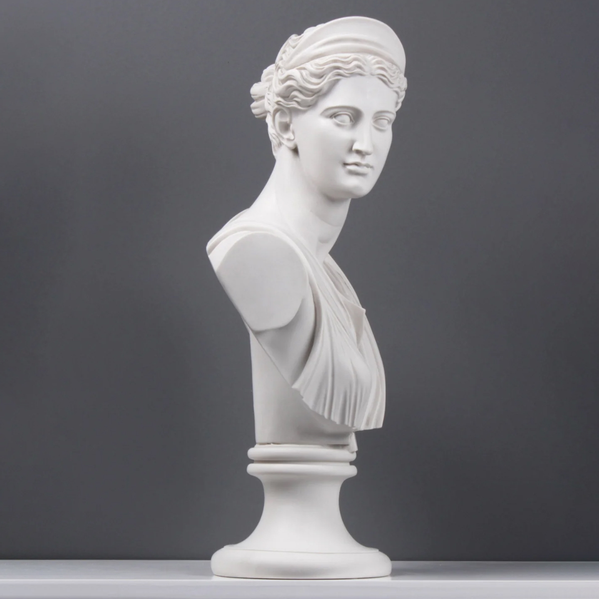 Diana Bust Sculpture featuring marble carving details