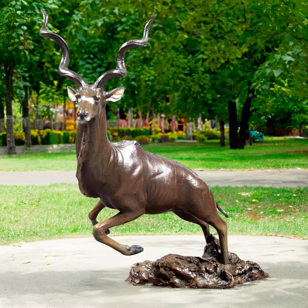 Dynamic bronze Kudu Sculpture showing a Greater Kudu in mid-leap with spiraled horns