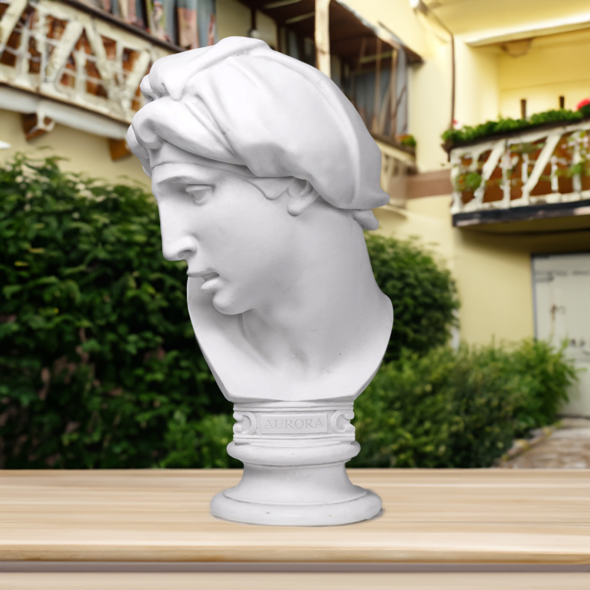 Front outdoor view of Aurora Bust replica in marble, featuring serene face and “AURORA” inscription