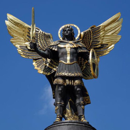 Front view of the Archangel Michael statue with golden wings and sword, Kyiv Independence Square