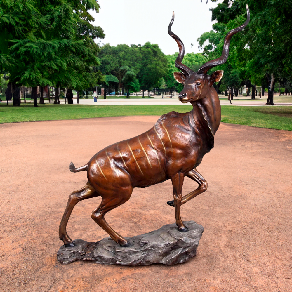 Graceful bronze Kudu Sculpture depicting a turning Greater Kudu with lifelike stripes and twisted antlers