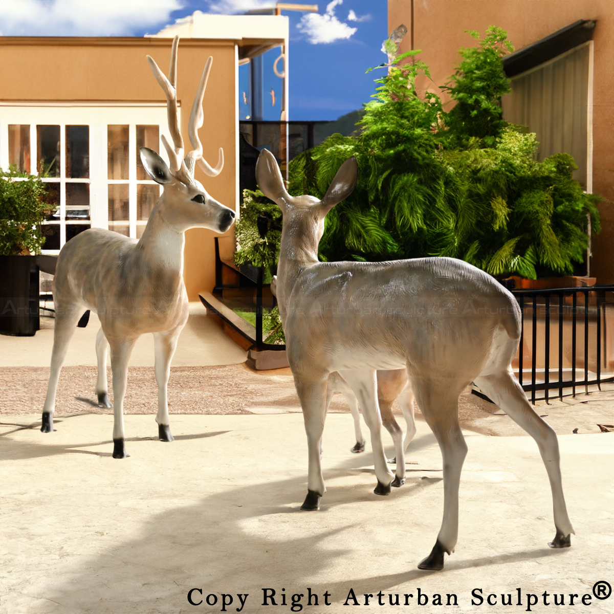 Life Size Deer Sculpture set of a buck, doe, and fawn made of fiberglass