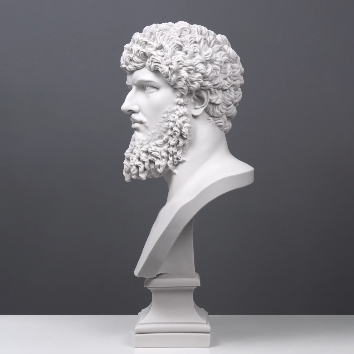 Lucius Verus Bust sculpture in marble, displaying defined curls and beard