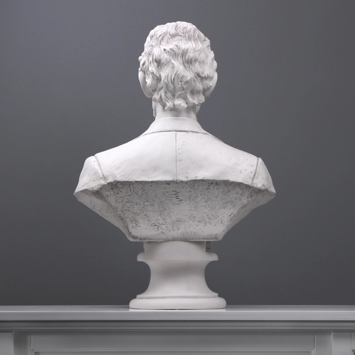 Marble bust sculpture of Abraham Lincoln viewed from the back