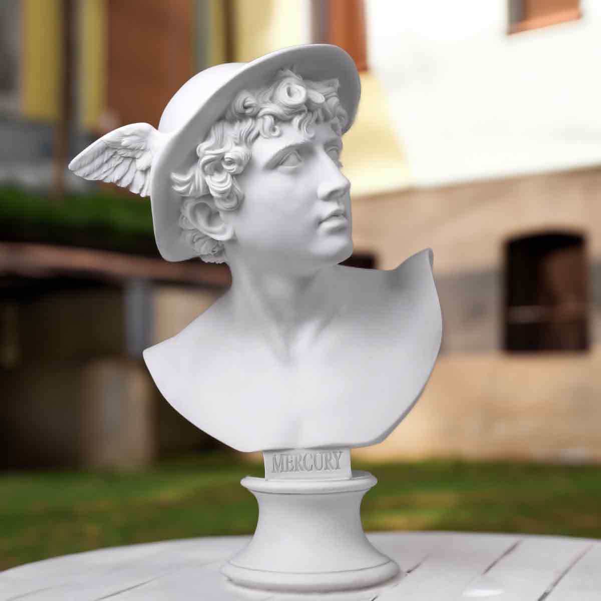 Mercury Bust on table with labeled pedestal and classical detail