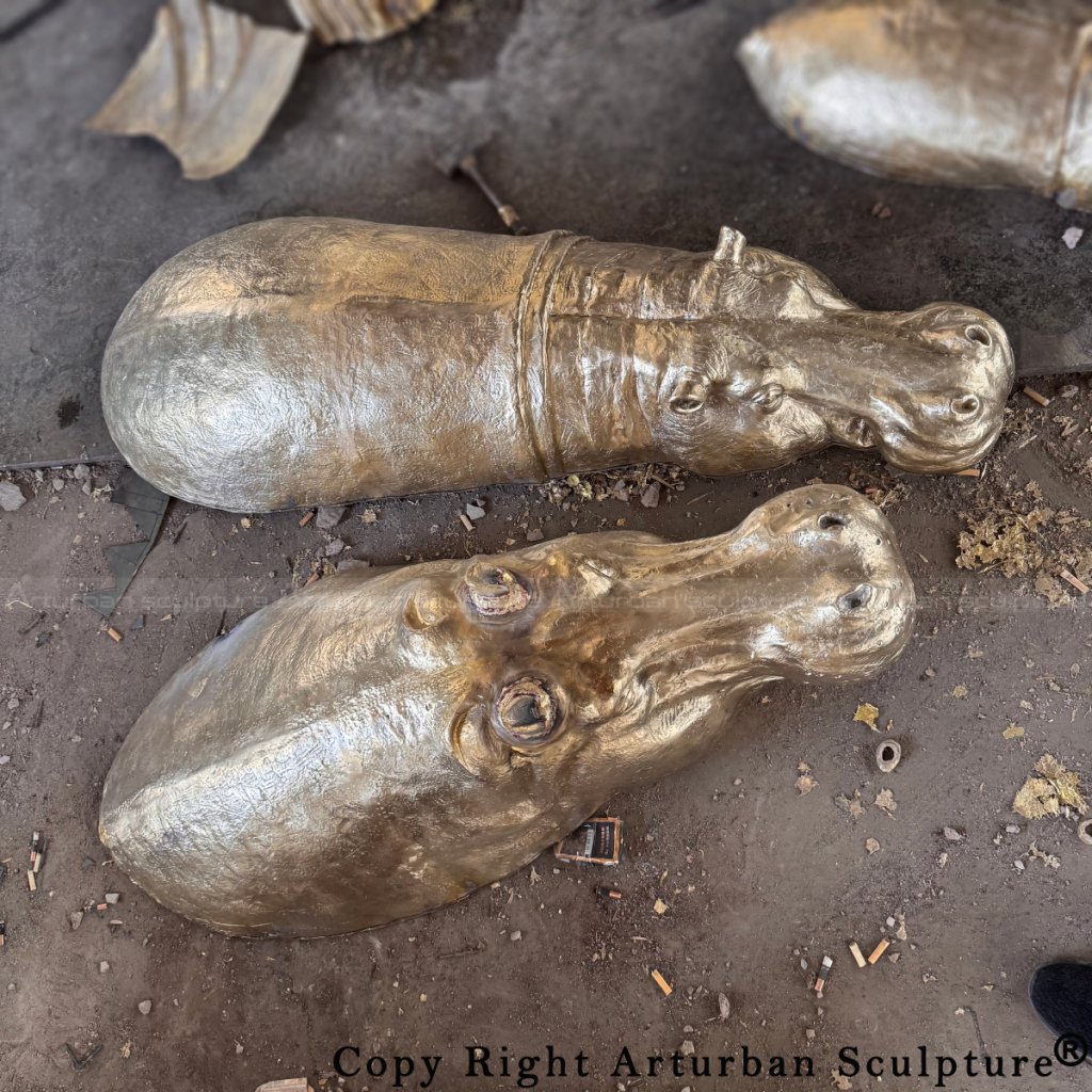 Raw Bronze Hippopotamus castings in workshop