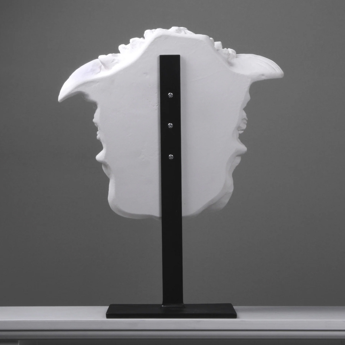 Rear mounting of Medusa Head Statue for Sale on black iron base
