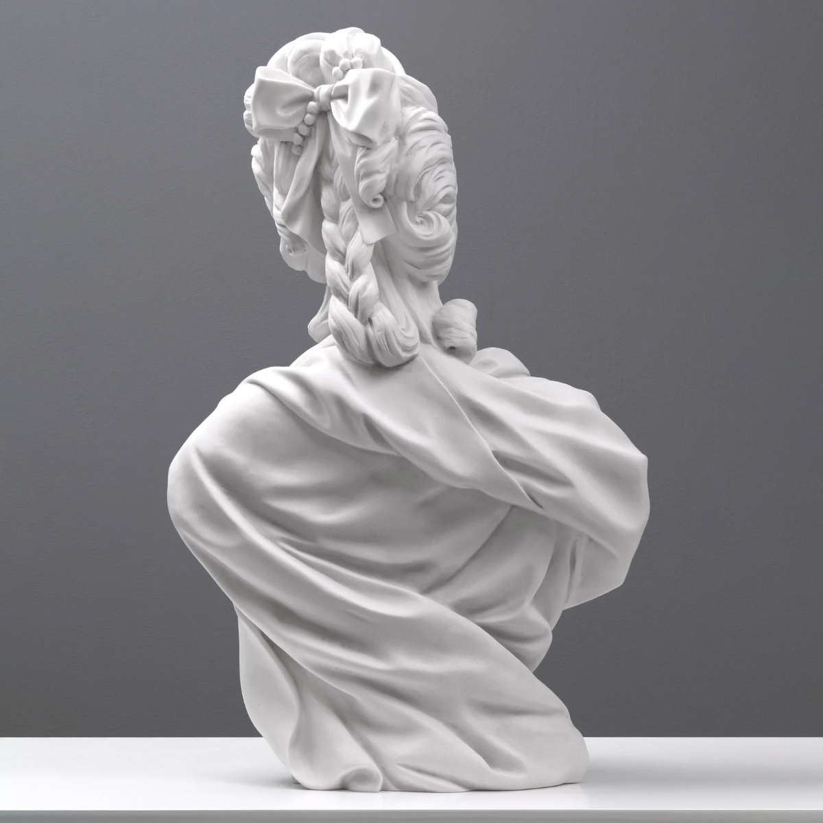 Rear view of Marie Antoinette Marble Bust showing detailed braided hairstyle with bow decoration